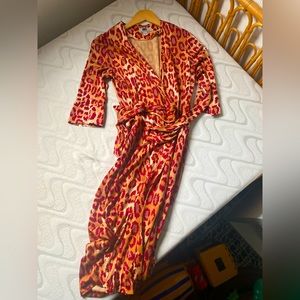 Vintage Diane Von Fursetenberg red leopard wrap dress. Silk Jersey, size 4.